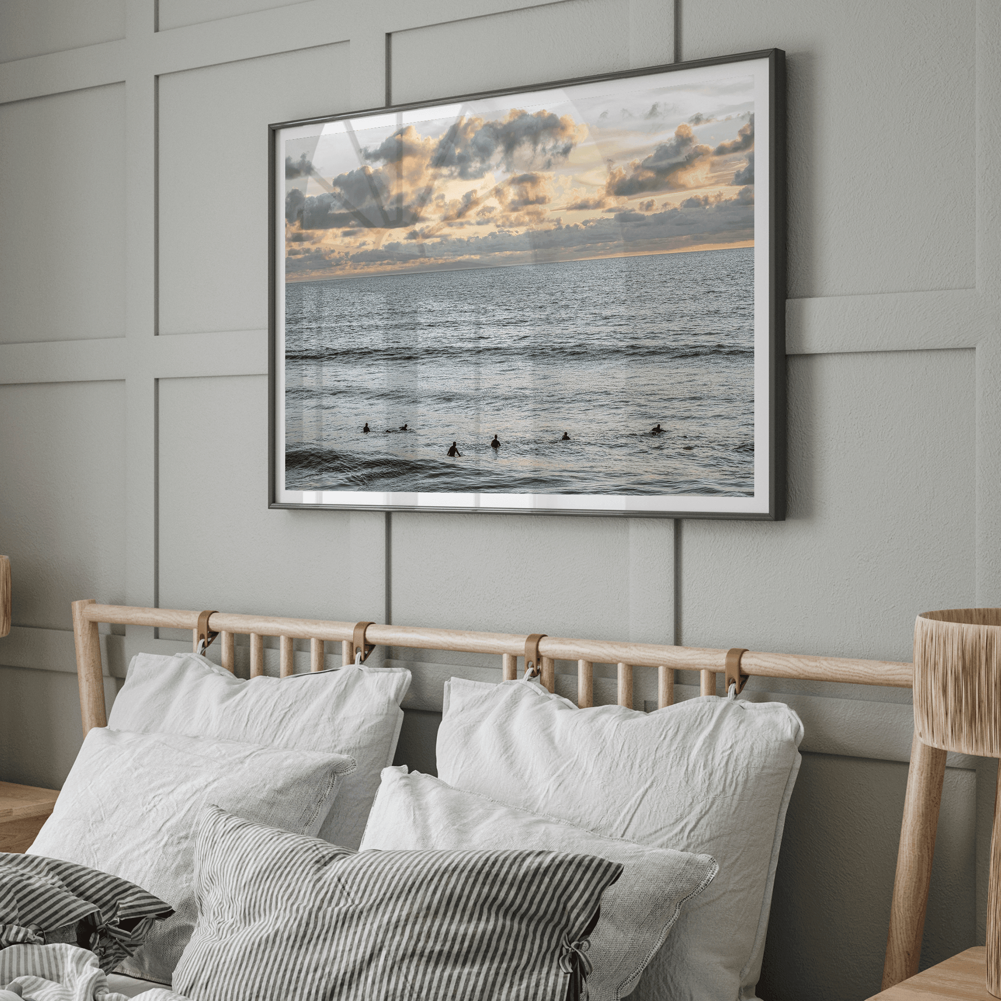 Sunset surf wall art featuring surfers’ silhouettes at Pismo Beach, California, with golden light, calm ocean, and vibrant sunset sky.