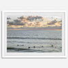 Sunset surf wall art featuring surfers’ silhouettes at Pismo Beach, California, with golden light, calm ocean, and vibrant sunset sky.
