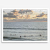 Sunset surf wall art featuring surfers’ silhouettes at Pismo Beach, California, with golden light, calm ocean, and vibrant sunset sky.