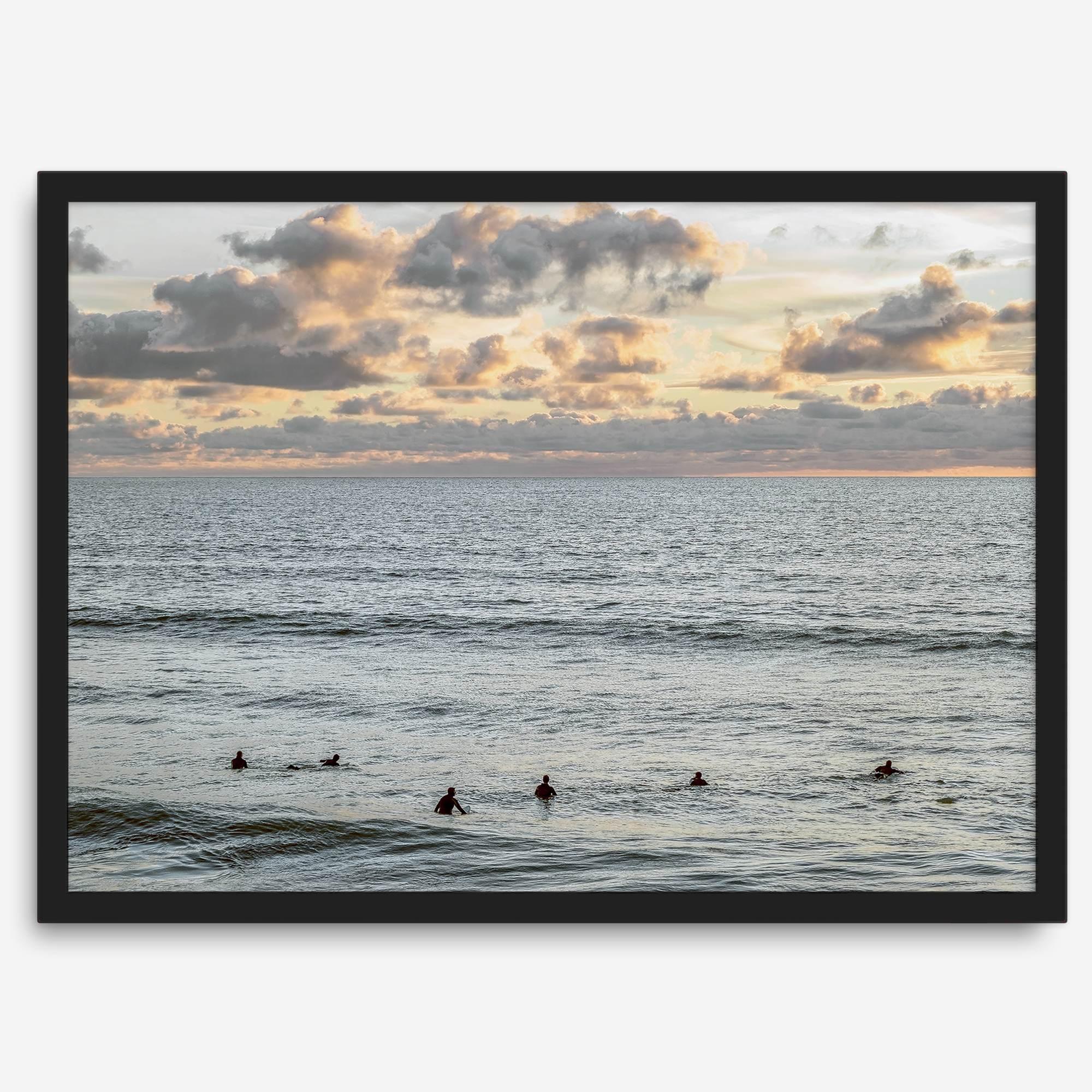 Sunset surf wall art featuring surfers’ silhouettes at Pismo Beach, California, with golden light, calm ocean, and vibrant sunset sky.