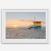 Venice Beach wall art featuring a colorful rainbow lifeguard tower beside the Pacific Ocean during a golden Los Angeles sunset.