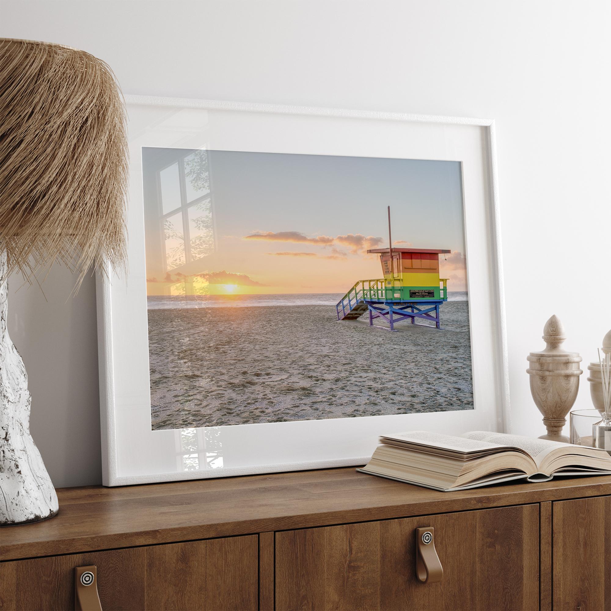 Venice Beach wall art featuring a colorful rainbow lifeguard tower beside the Pacific Ocean during a golden Los Angeles sunset.