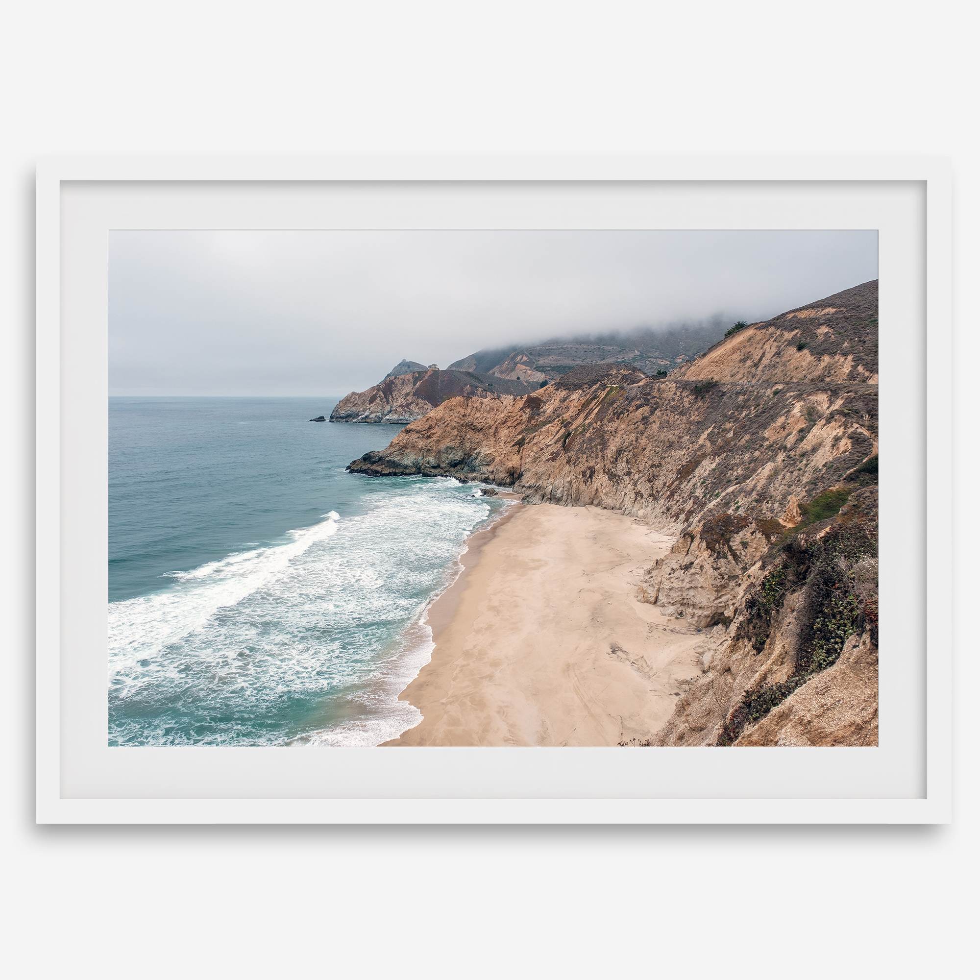 California beach wall art featuring Gray Whale Cove Beach with sandy shores, rugged cliffs, and misty Pacific Ocean waves.