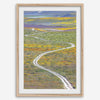 fine art photography print of a winding road disappearing into a valley filled with colorful wildflowers in Antelope Valley, California.