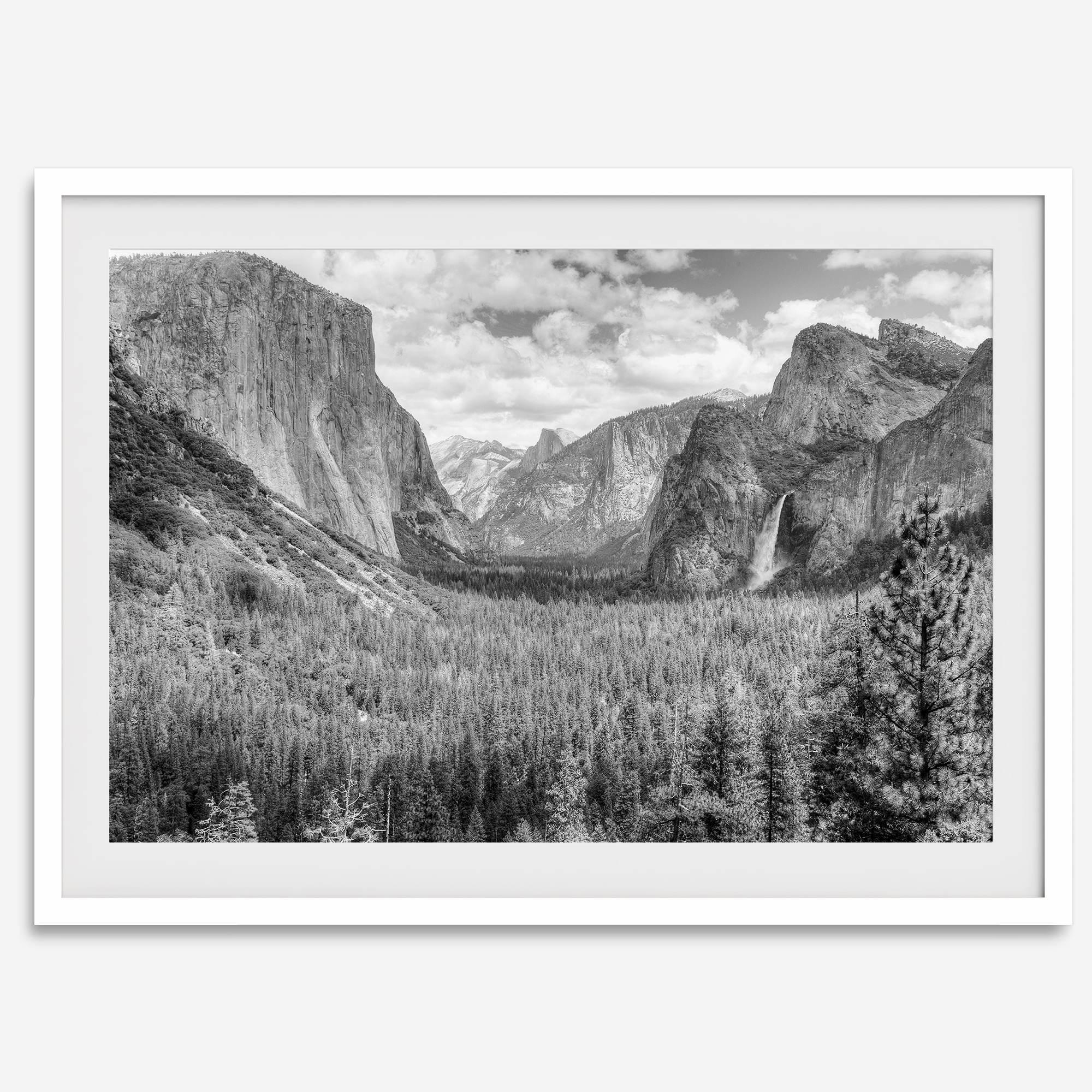 A breathtaking fine art black and white print of Yosemite valley during spring when the waterfalls are in full power.
