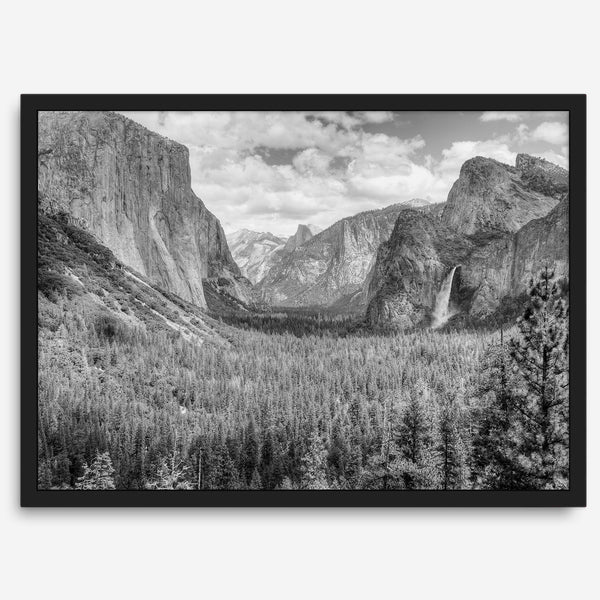 A breathtaking fine art black and white print of Yosemite valley during spring when the waterfalls are in full power.