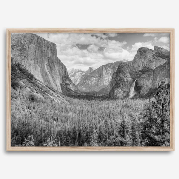 A breathtaking fine art black and white print of Yosemite valley during spring when the waterfalls are in full power.