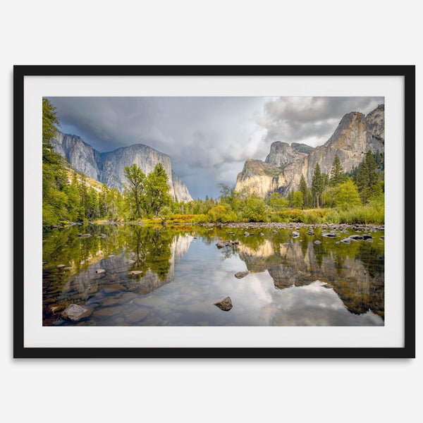 A stunning framed large Yosemite National Park print that shows the breathtaking valley at sunset with its mountains, rivers, forests, and waterfalls. A truly mesmerizing landscape that is as perfect as your wall decor as it is a special gift.