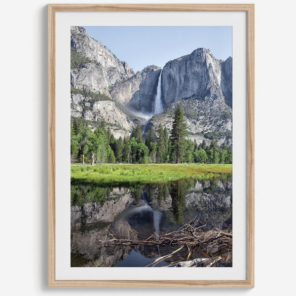 A stunning fine art print of Yosemite Falls with a reflection from Cook Meadows in Yosemite National Park.