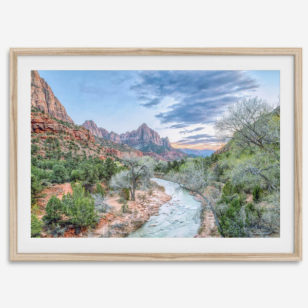 A framed fine art landscape photography print of Zion National Park showing a beautiful river, trees, and desert landscape with the backdrop of Zion mountain range. This Utah wall art is perfect for nature photography and desert art enthusiasts.