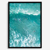 A fine art aerial ocean photography print showing surfers paddling for waves. Stunning blue wall art for home decor. 