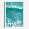 A fine art aerial ocean photography print showing surfers paddling for waves. Stunning blue wall art for home decor. 
