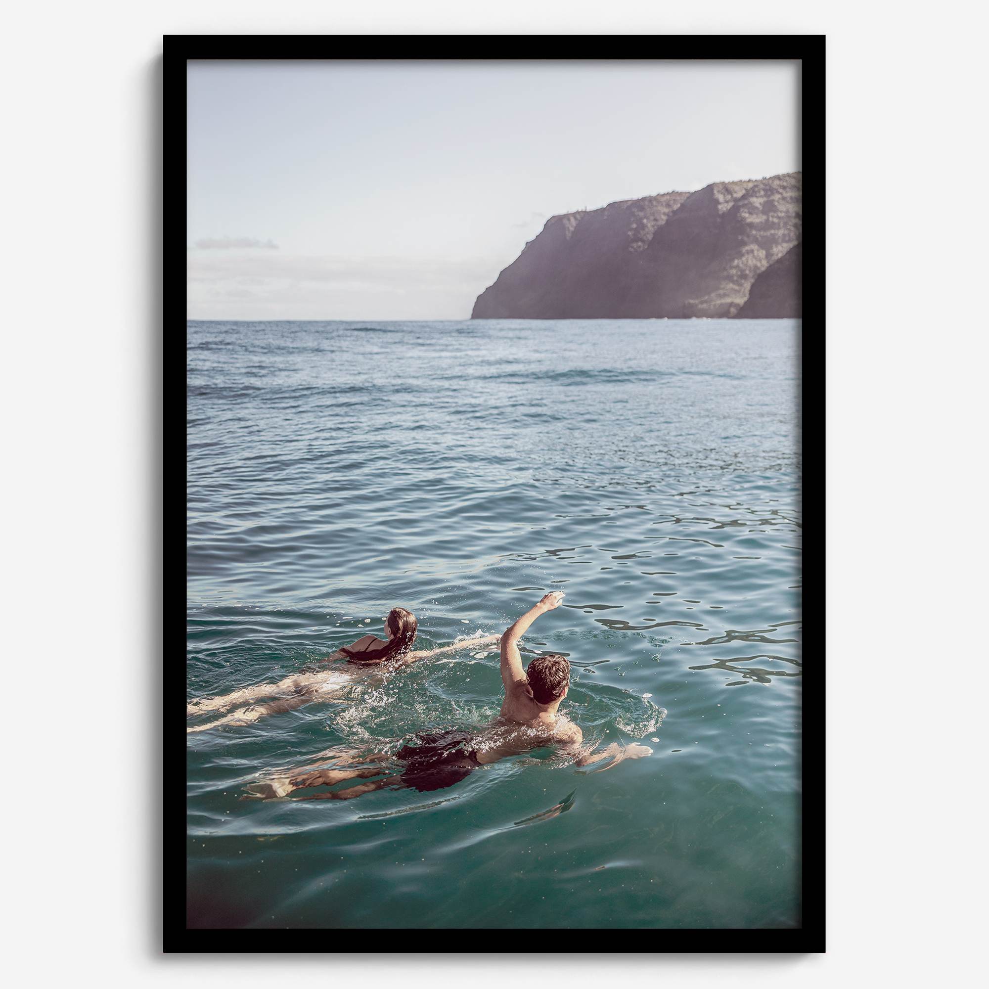 Summer wall art of a coastal Hawaiian landscape with figures swimming in deep blue ocean water.