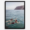 Summer wall art of a coastal Hawaiian landscape with figures swimming in deep blue ocean water.