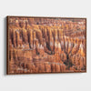 Large framed Bryce Canyon wall art featuring towering orange sandstone hoodoos and intricate rock formations in Bryce Canyon National Park, Utah.