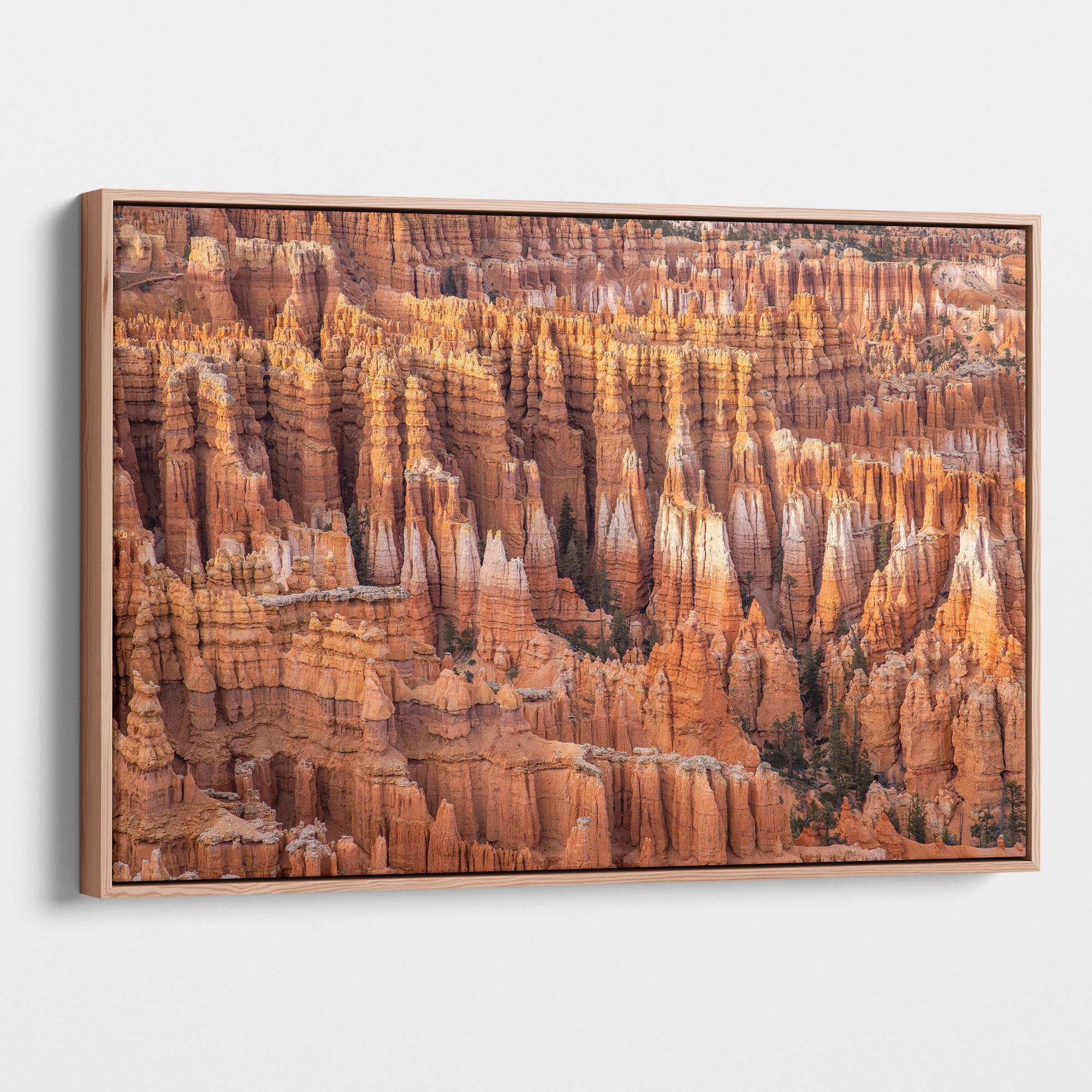 Large framed Bryce Canyon wall art featuring towering orange sandstone hoodoos and intricate rock formations in Bryce Canyon National Park, Utah.