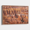 Large framed Bryce Canyon wall art featuring towering orange sandstone hoodoos and intricate rock formations in Bryce Canyon National Park, Utah.
