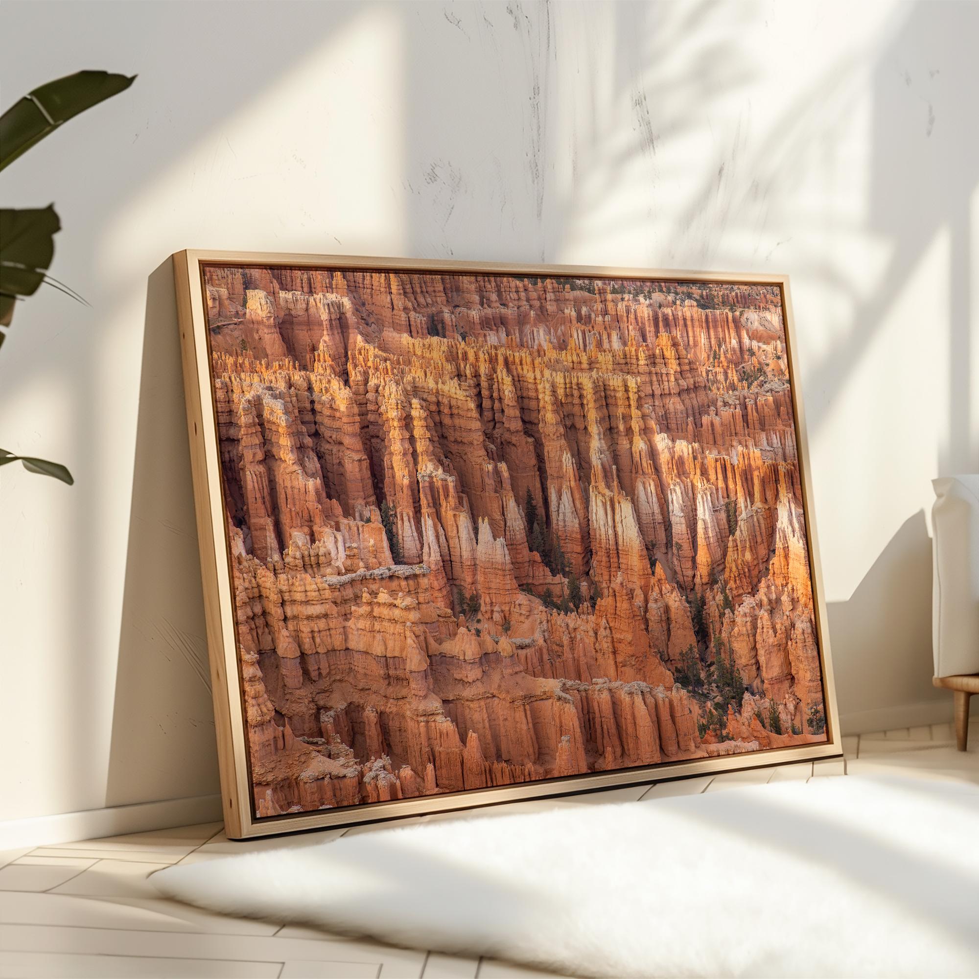 Large framed Bryce Canyon wall art featuring towering orange sandstone hoodoos and intricate rock formations in Bryce Canyon National Park, Utah.