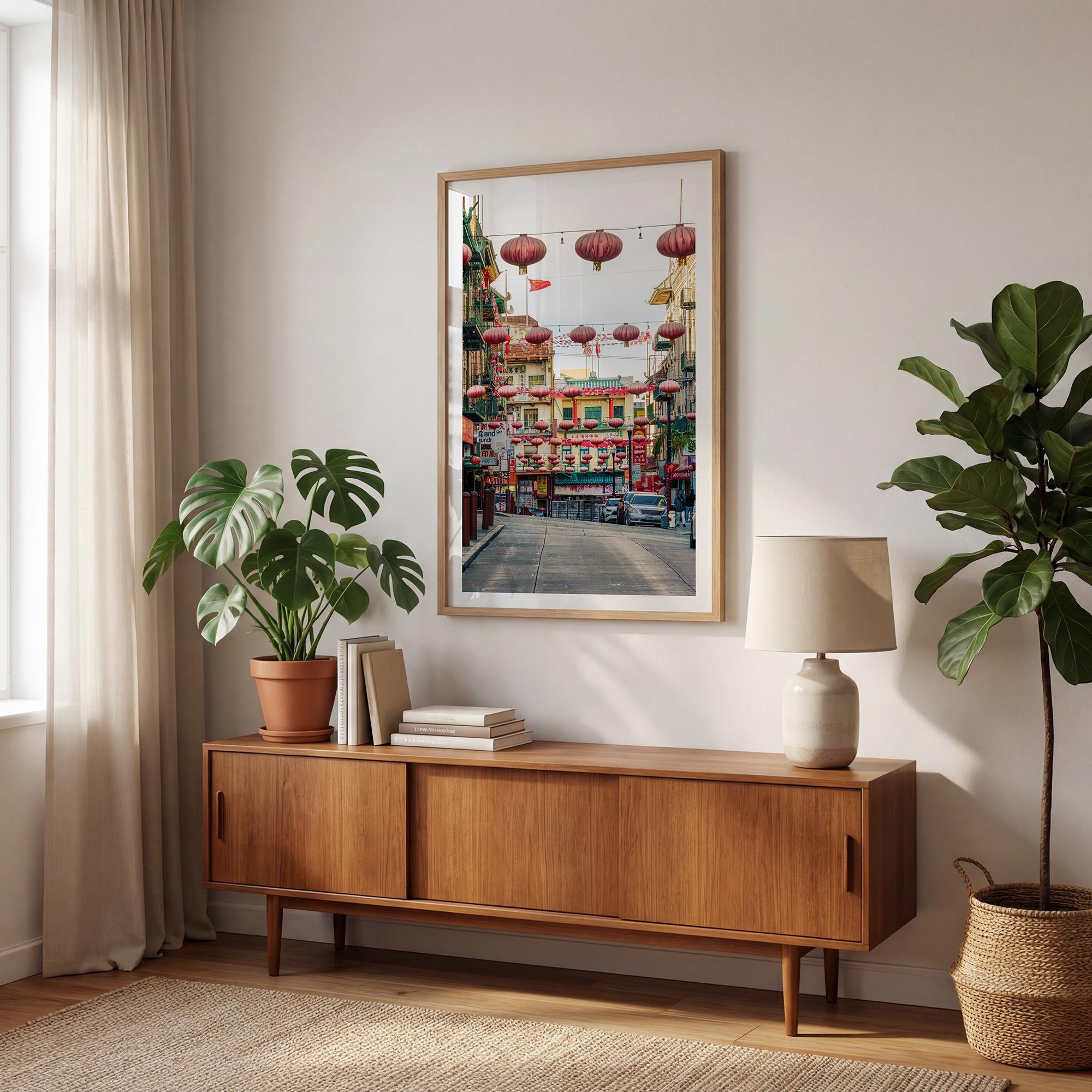 Chinatown Photography framed or unframed print showing red lanterns above a colorful San Francisco Chinatown street with shops and historic architecture.