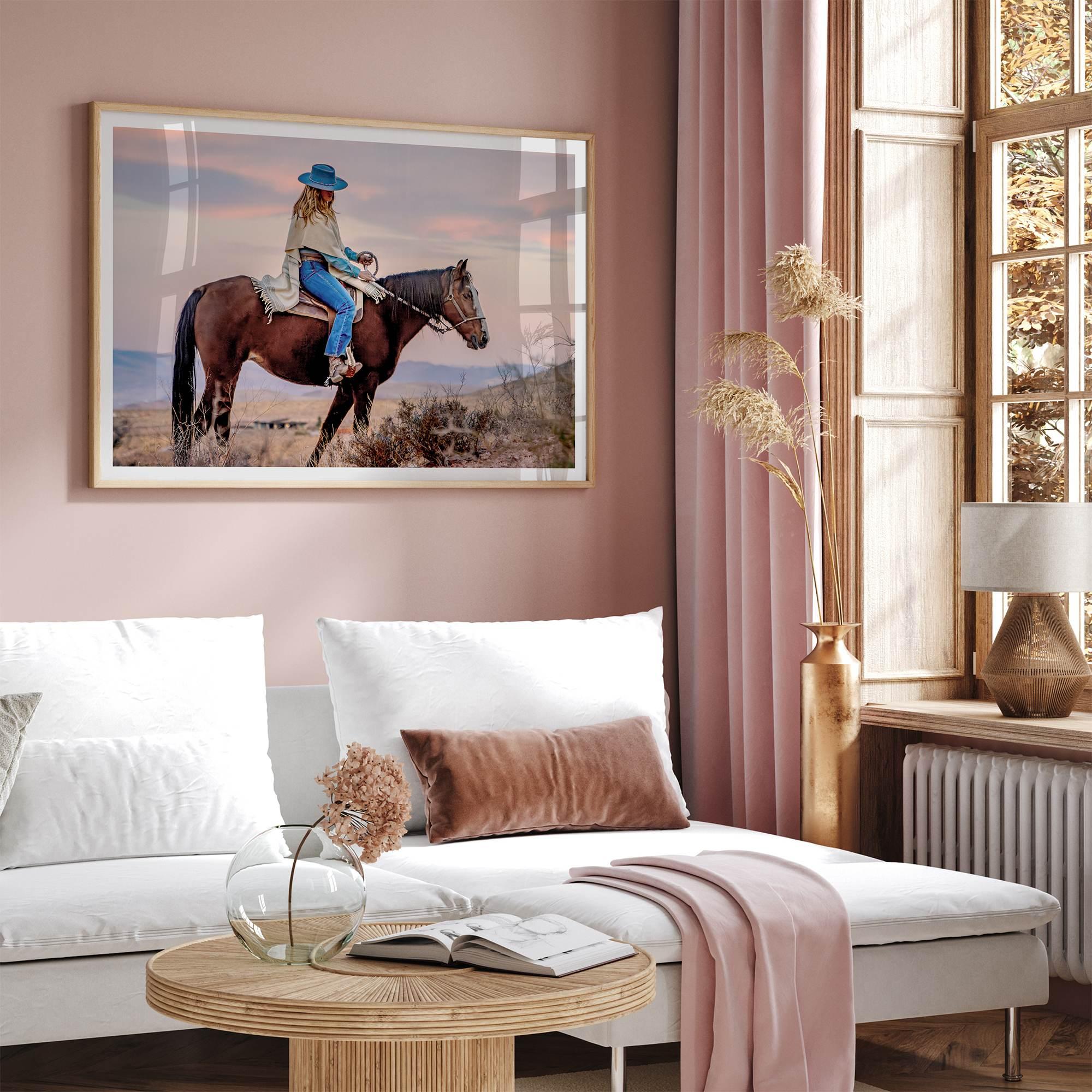 Cowgirl on horseback at sunset in desert landscape – rustic western wall decor print