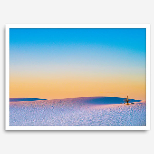 Panoramic desert landscape photography print showing White Sands National Park at sunset with blue sky and golden horizon.