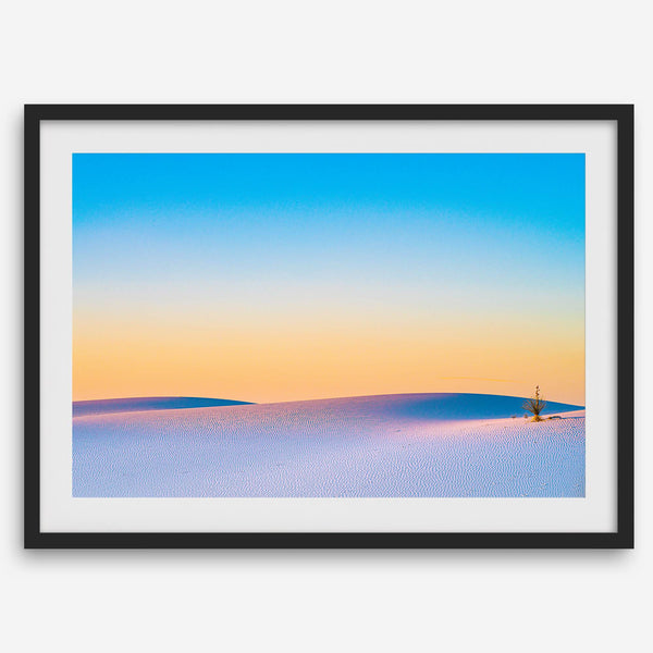 Panoramic desert landscape photography print showing White Sands National Park at sunset with blue sky and golden horizon.