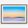 Panoramic desert landscape photography print showing White Sands National Park at sunset with blue sky and golden horizon.