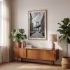 Framed Manhattan Bridge photography print in Dumbo Brooklyn with cobblestone street and monochrome architecture