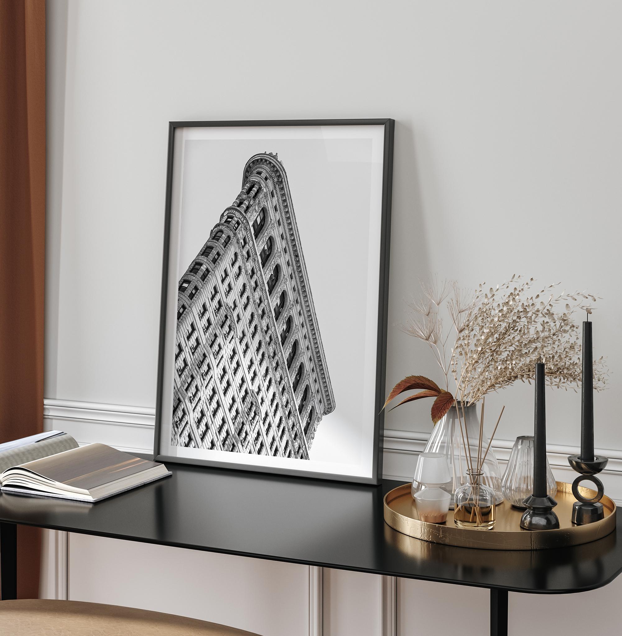 Black and white Flatiron Building print showing the iconic New York City landmark from a dramatic upward perspective