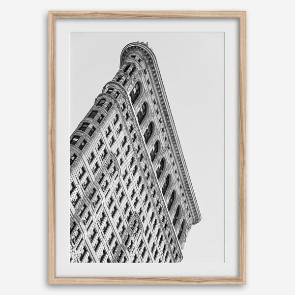 Black and white Flatiron Building print showing the iconic New York City landmark from a dramatic upward perspective