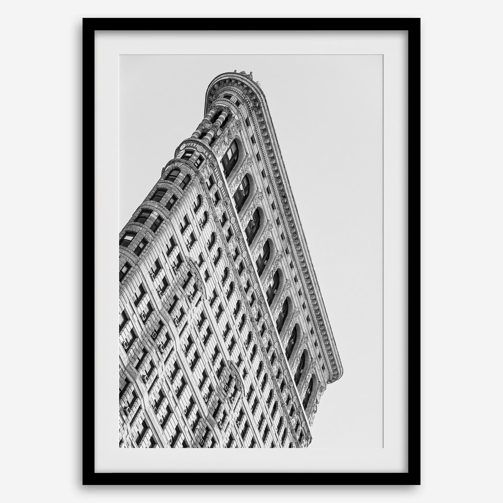 Black and white Flatiron Building print showing the iconic New York City landmark from a dramatic upward perspective