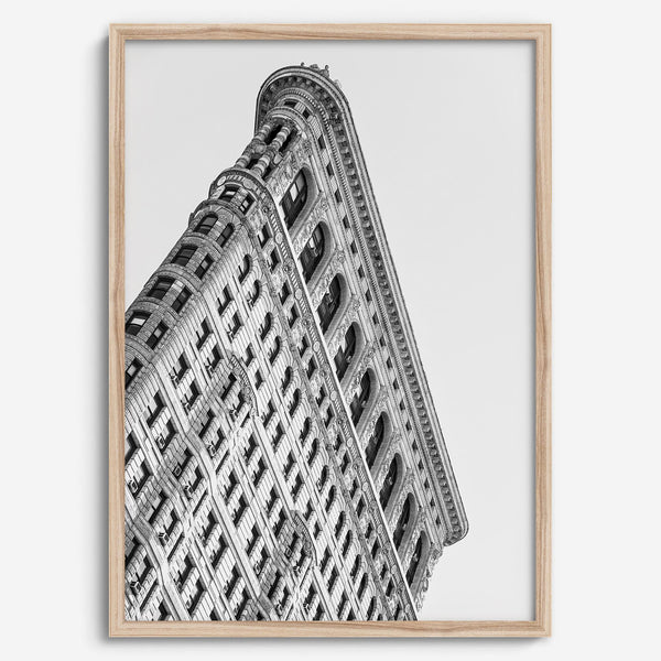 Black and white Flatiron Building print showing the iconic New York City landmark from a dramatic upward perspective