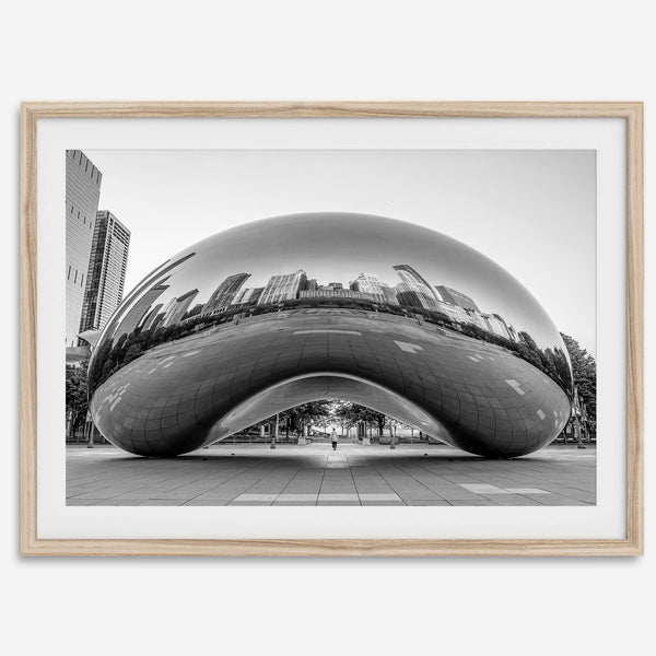 Black-and-white Chicago wall art of the Cloud Gate sculpture reflecting the city’s skyline.