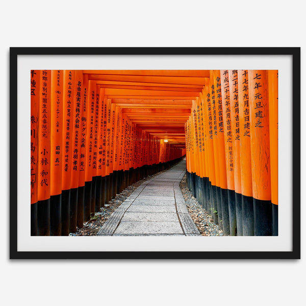 Framed photograph of the Fushimi Inari Torii Gates in Kyoto, Japan, showcasing vibrant vermilion gates.