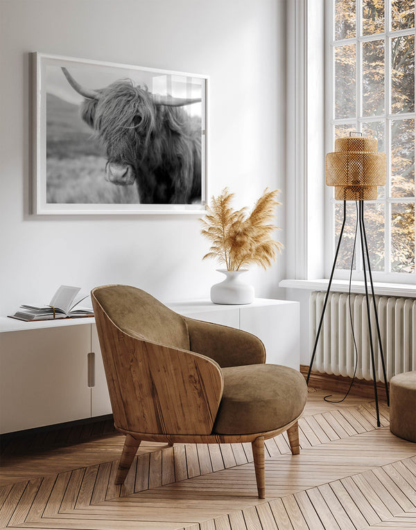 Fine art black and white Highland cow wall art featuring a close-up portrait captured in the Scotland Highlands.