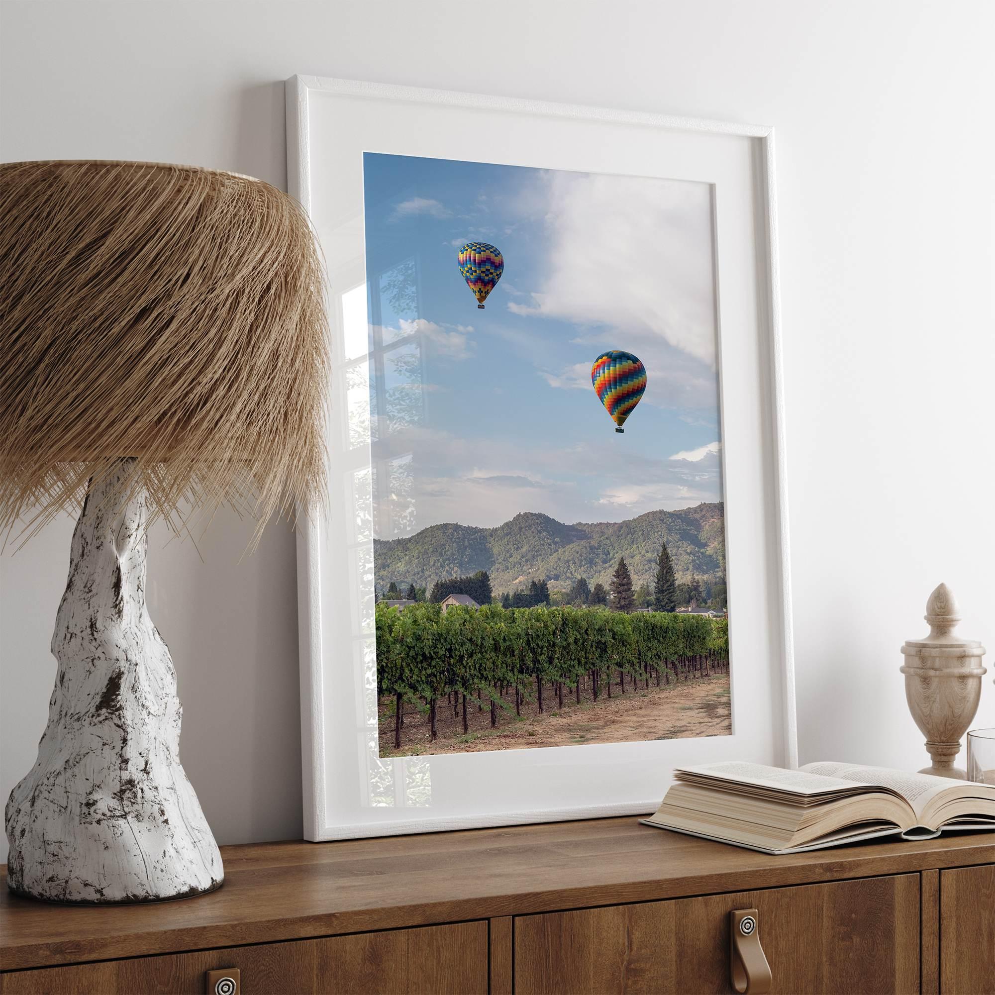 Fine art hot air balloon photography print above Napa Valley vineyards in Yountville.