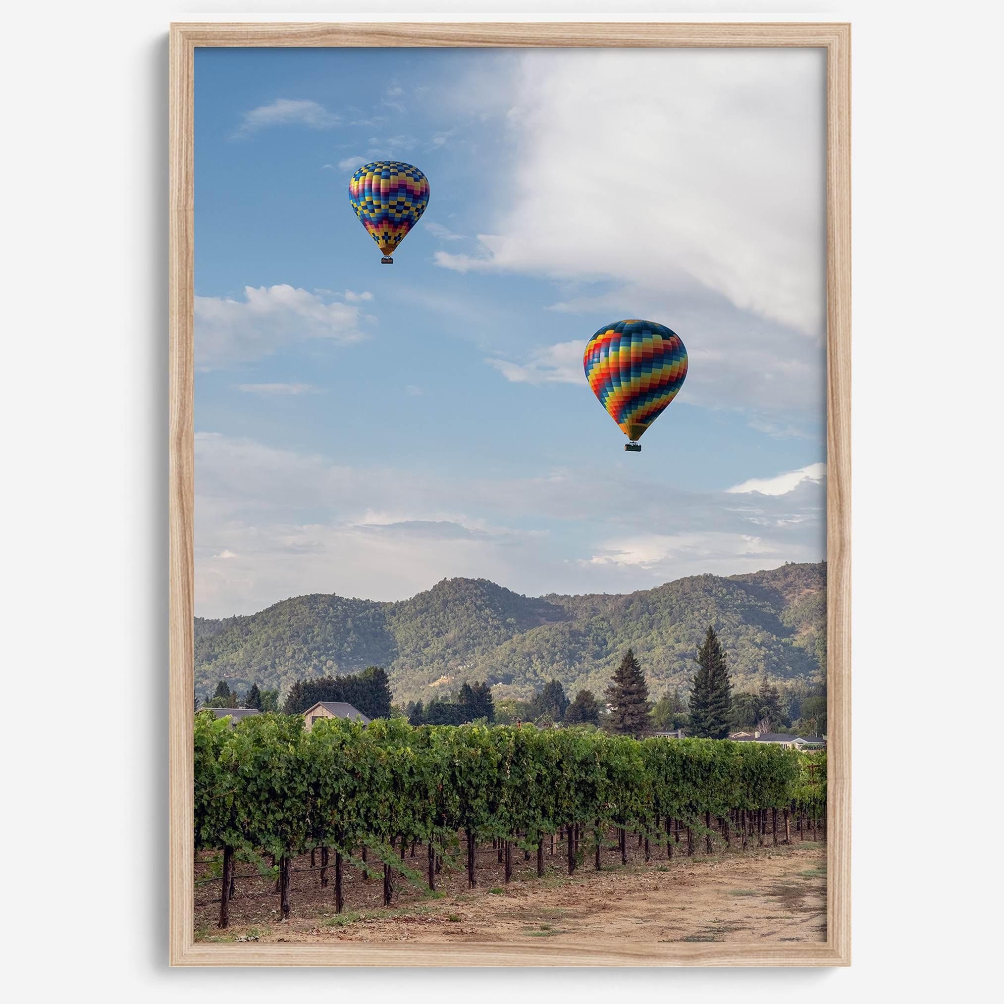 Fine art hot air balloon photography print above Napa Valley vineyards in Yountville.