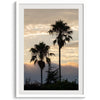 Palm tree wall art featuring two silhouetted palms at sunrise along a California beach.