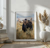 Fine art photograph of a majestic bull moose in Grand Teton National Park surrounded by golden grasses.