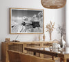 Black and white mountain cabin wall art with helicopter over snowy Denali peaks, Alaska winter landscape photography print.