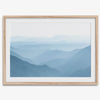 A fine art mountain photography print showing tens of shaded mountains one after the other. This minimalist mountain range wall art is perfect for nature lovers.