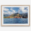 An extra large wall art showcasing the vertical green volcanic cliffs of Na Pali Coast Kauai meeting the blue Pacific Ocean.