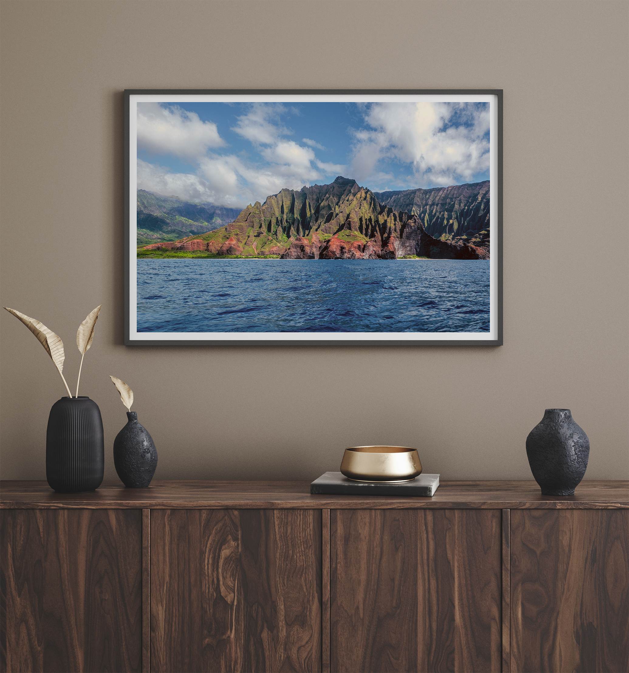 An extra large wall art showcasing the vertical green volcanic cliffs of Na Pali Coast Kauai meeting the blue Pacific Ocean.