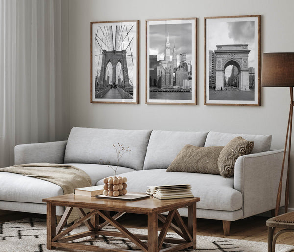 Framed New York photography set with Brooklyn Bridge, Chrysler Building skyline, and Washington Square Park scenes.