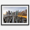 Urban landscape photography of Lower Manhattan from Brooklyn Bridge Park waterfront.