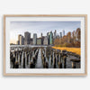Urban landscape photography of Lower Manhattan from Brooklyn Bridge Park waterfront.