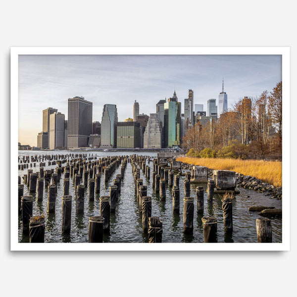 Urban landscape photography of Lower Manhattan from Brooklyn Bridge Park waterfront.
