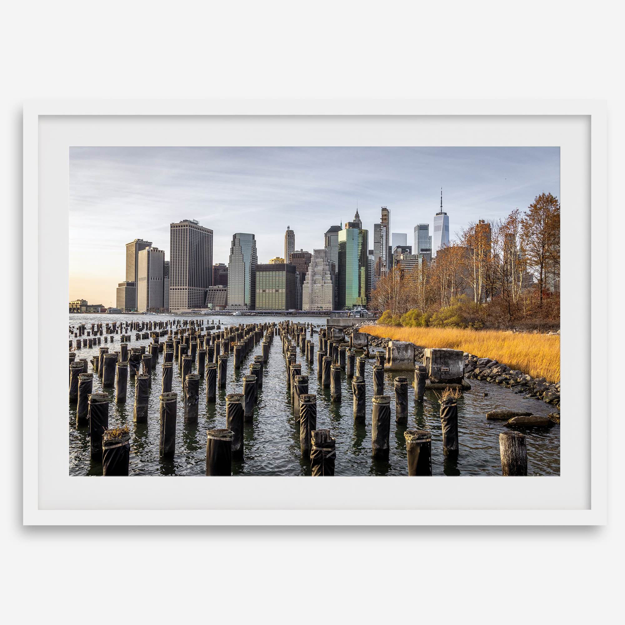 Urban landscape photography of Lower Manhattan from Brooklyn Bridge Park waterfront.