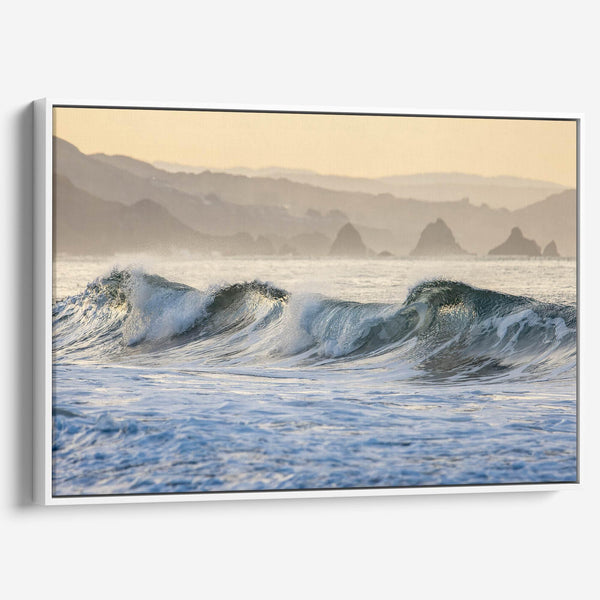 Golden hour ocean waves crashing with coastal cliffs in background – fine art seascape print