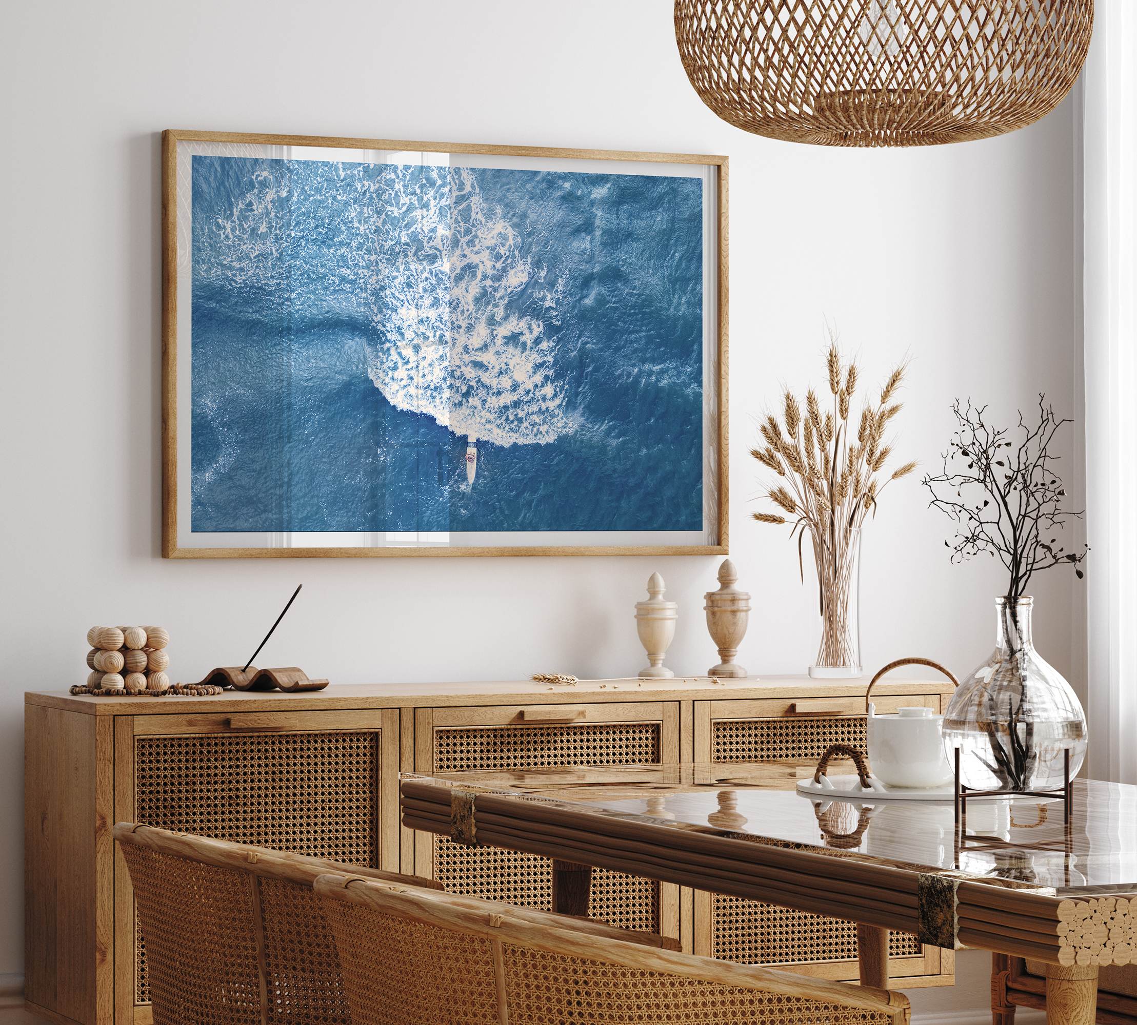 Ocean wave aerial photography print featuring a surfer in Kauai Hawaii with modern coastal styling